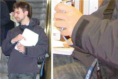 Figure 4. One of the earlier setups had the moderator-controlled camera built in a fake shell of a mobile phone. The wire goes through the sleeve to a recorder on the waist. This solution allows for quiet, non-visible recording in public places.