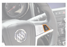 picture of a steering wheel with the volume control highlighted