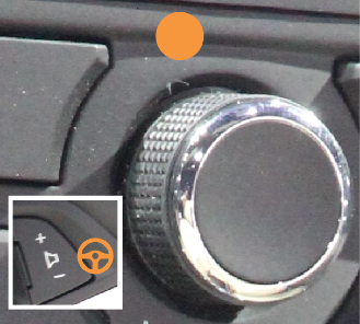 combination picture of the volume control for the steering wheel and center fascia